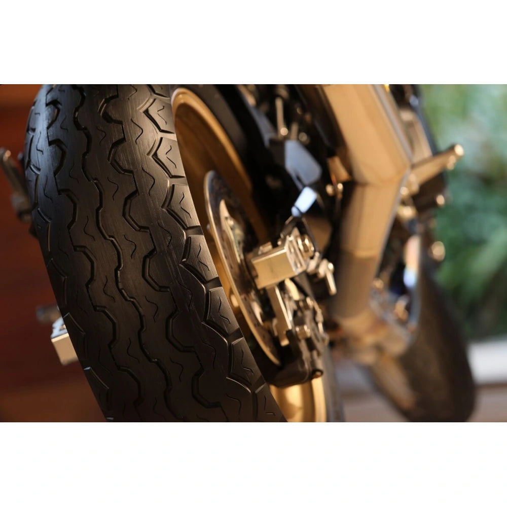 Dunlop TT100 GP 130/80-18 66H TT – bagdæk – originalt Dunlop bagdæk med klassisk TT-look med moderne greb. Køb hos Mo2parts. Produktbillede 2.